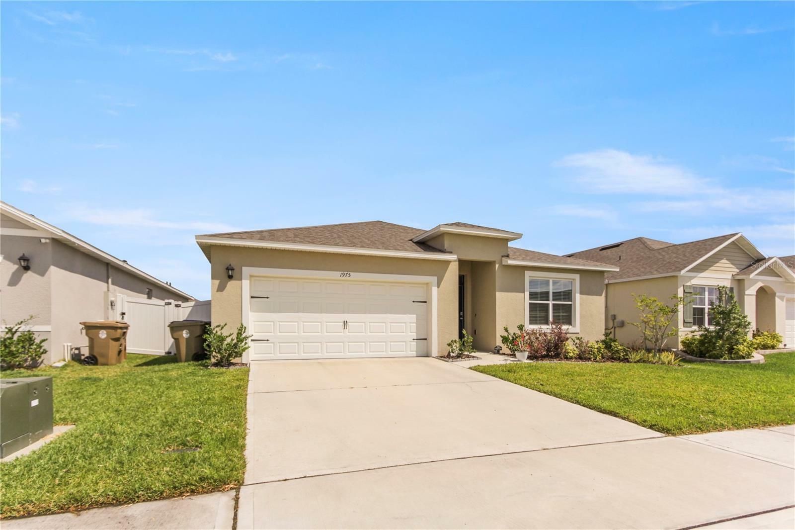 Property Photo: 1975 Cacutta Way FL 34744