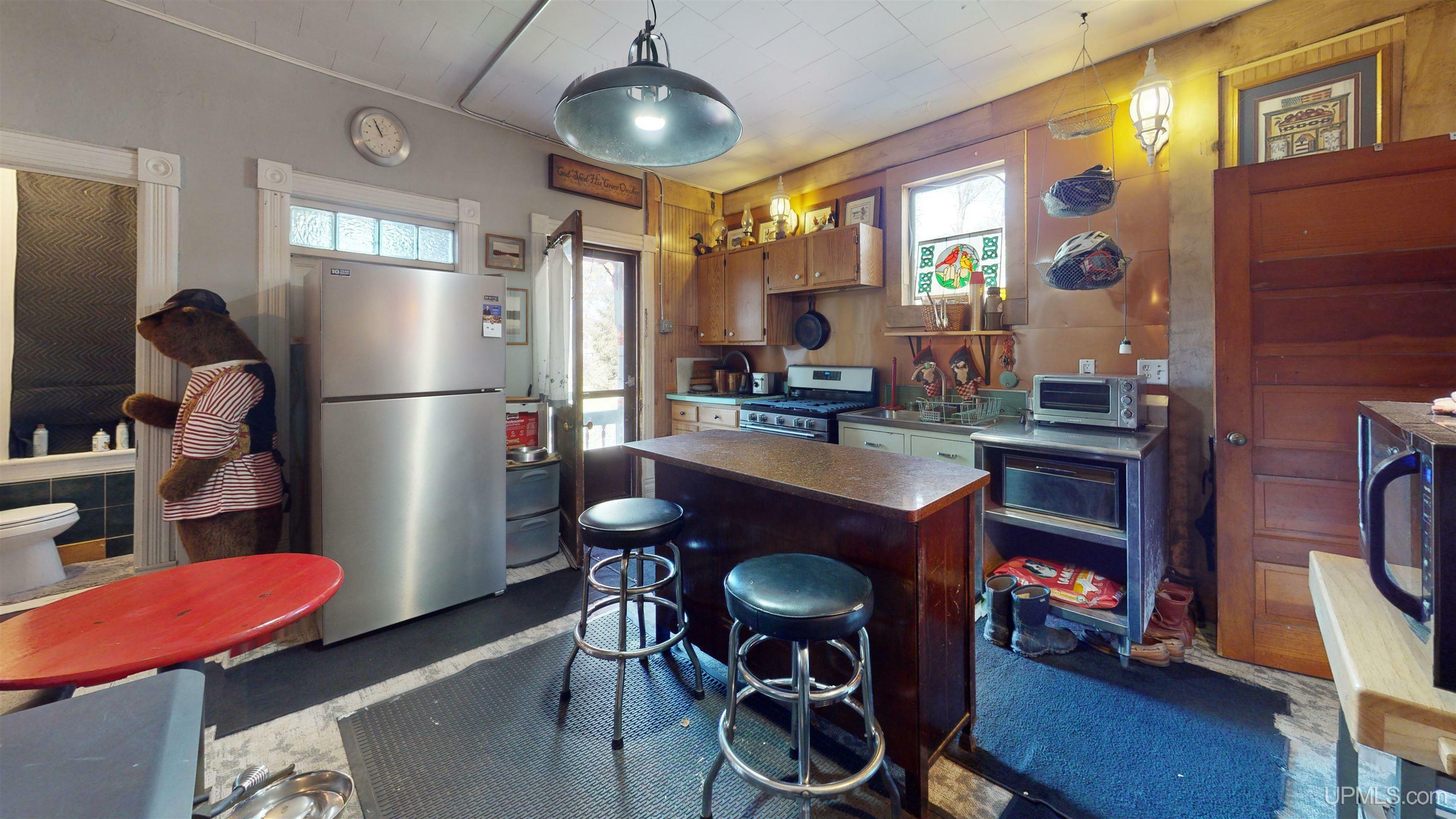 Property Photo:  417 Tamarack Street  MI 49913 