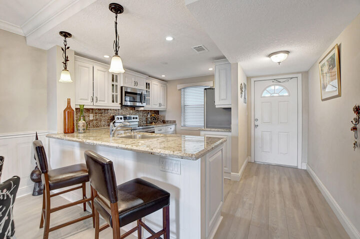 Property Photo: 9810 Marina Boulevard 1120 FL 33428
