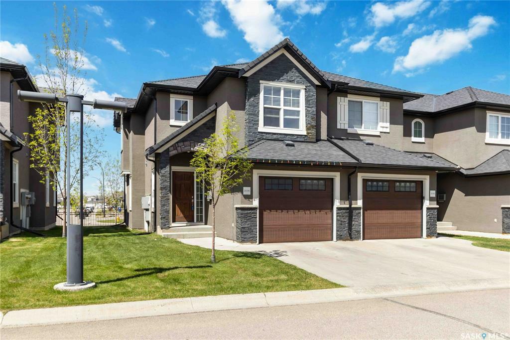 Property Photo: 1303 Paton Crescent 205 SK S7W 0P7