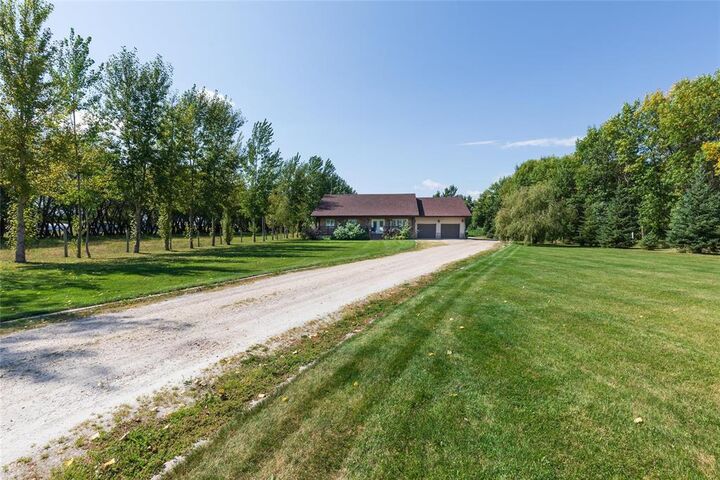 Property Photo: 21062 33 Road East MB R0A 0J0