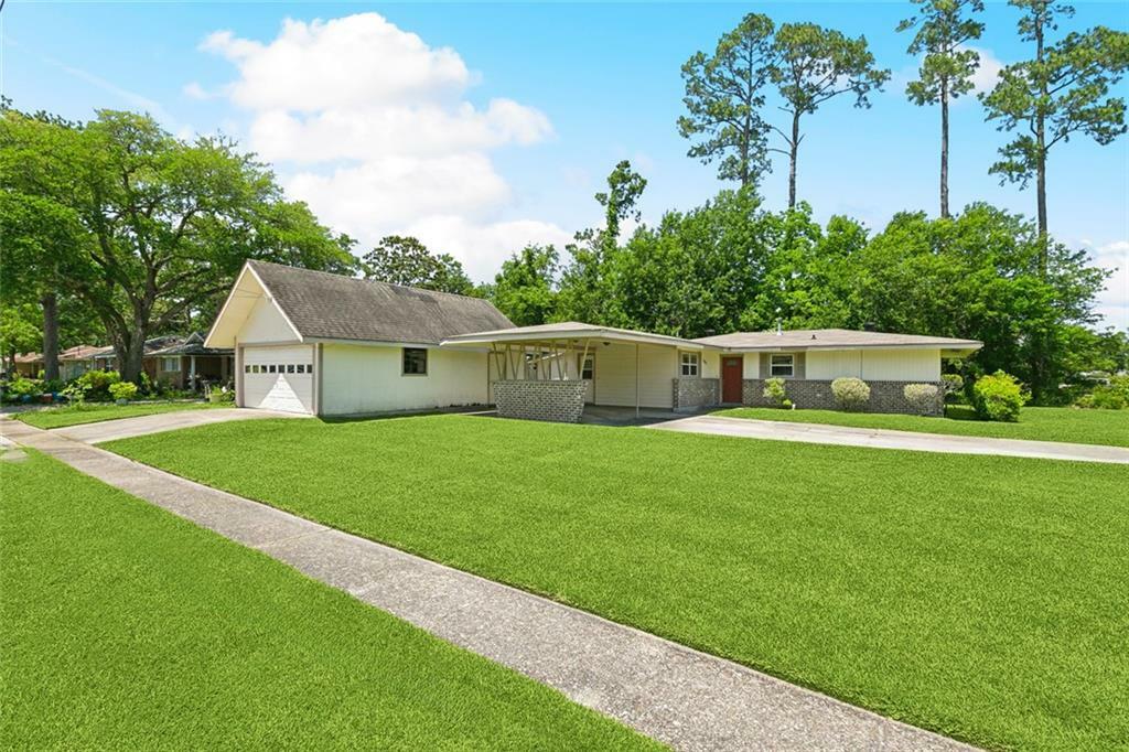 Property Photo: 409 Markham Drive LA 70458