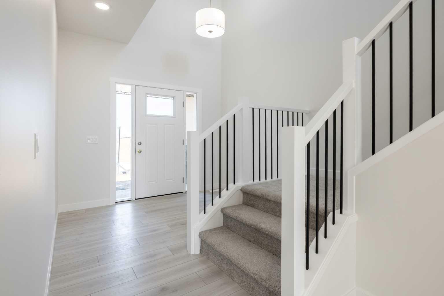 Property Photo: 145 Sunstone Way AB T4B 5T5