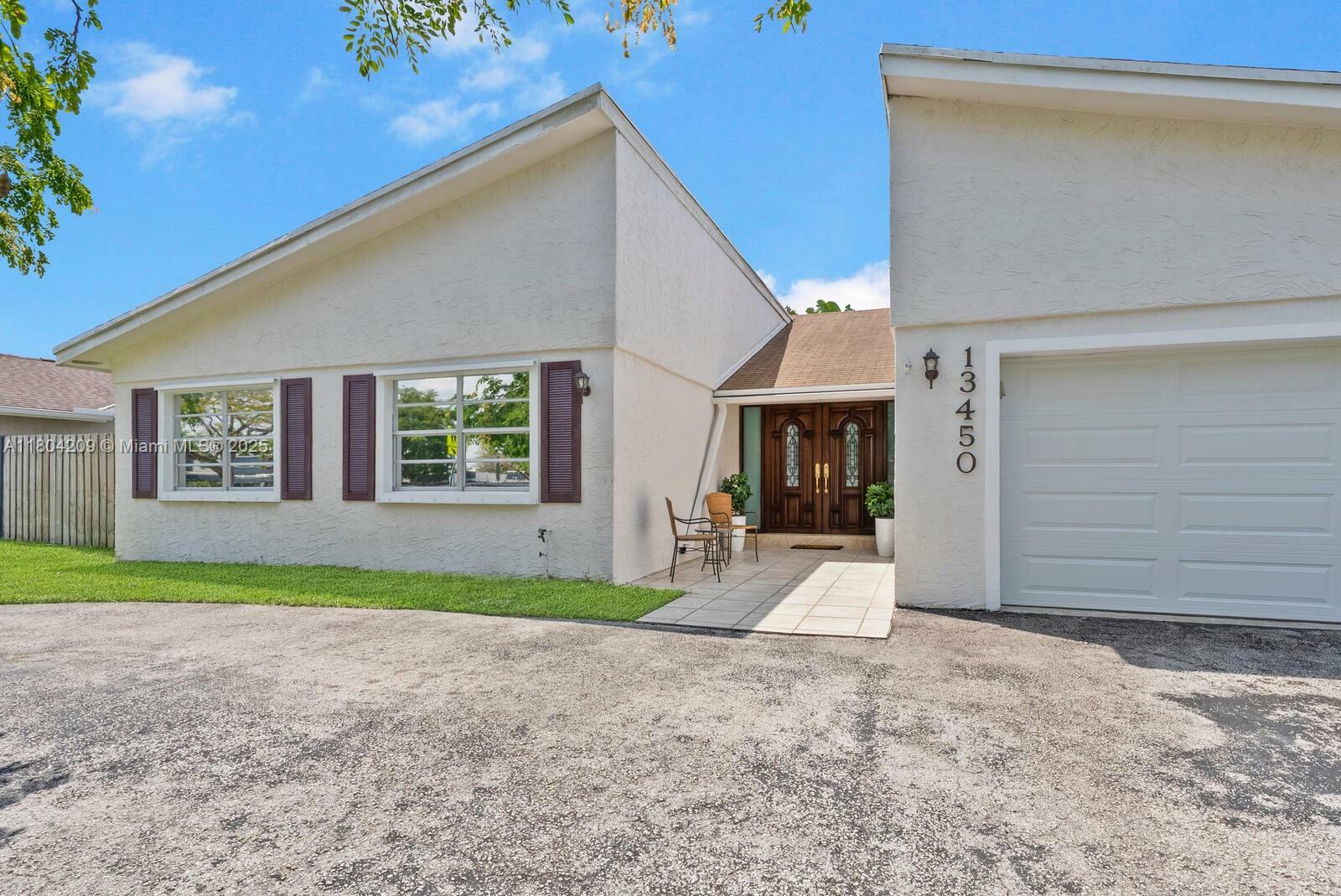 Property Photo: 13450 SW 96th St FL 33186