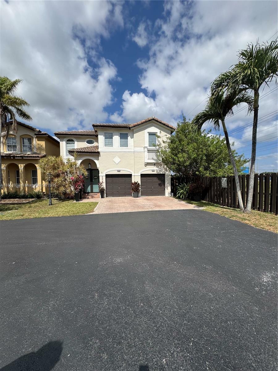 Property Photo: 4892 NW 109th Pl FL 33178