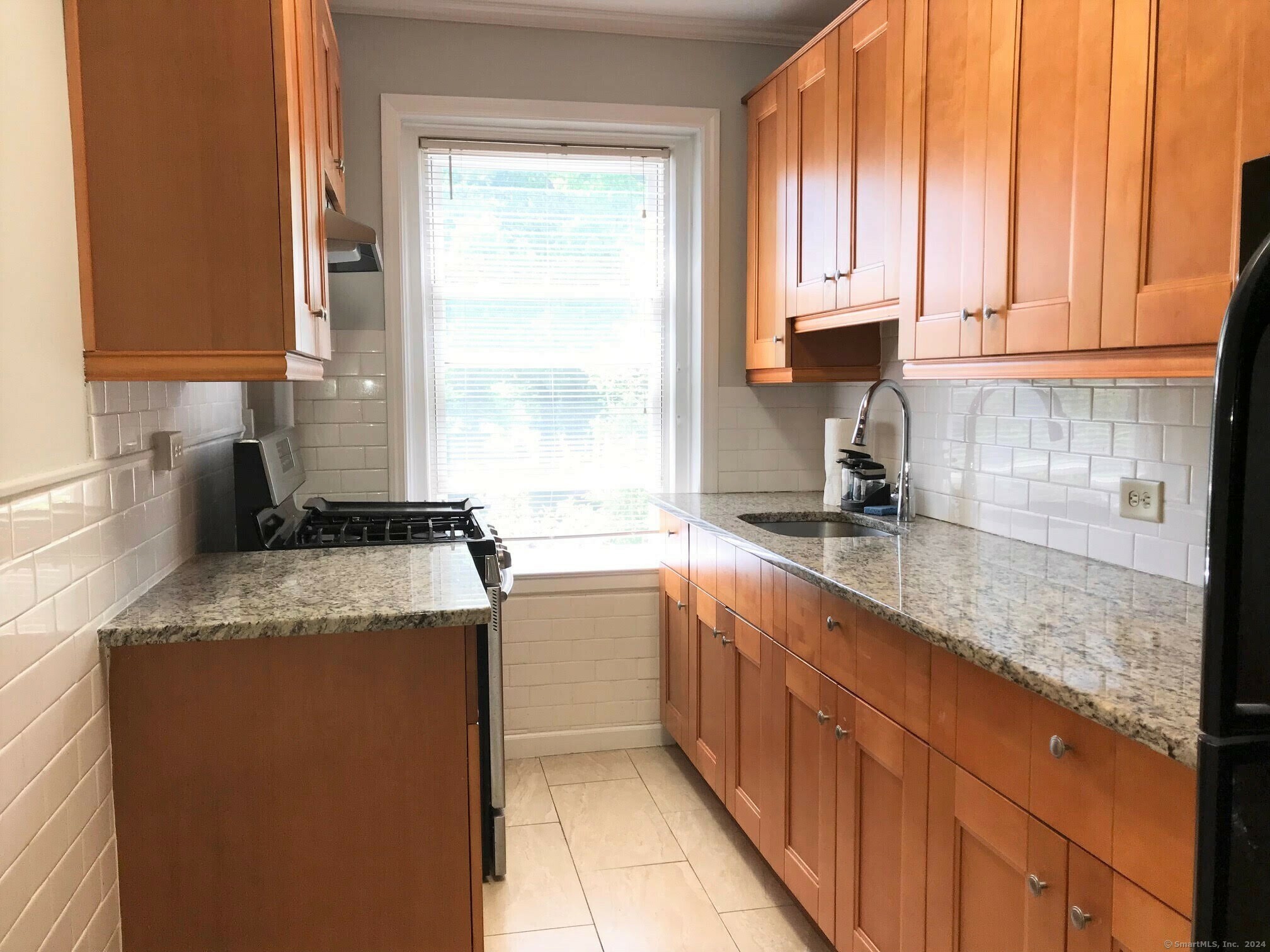 Property Photo: 112 Woodside Green 2A CT 06905
