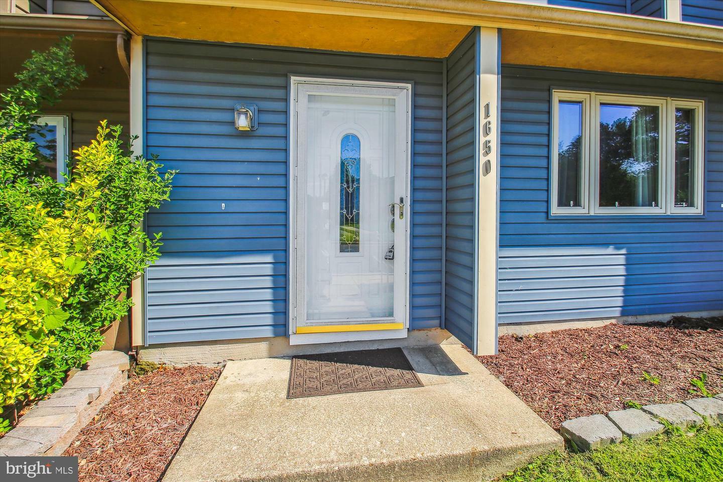 Property Photo: 1650 Woodtree Ct E MD 21409
