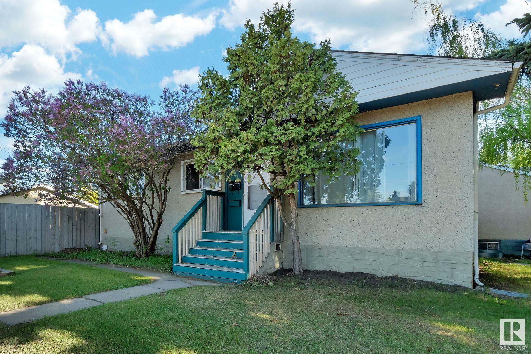 Property Photo: 12707 107 Avenue NW AB T5M 1Z7