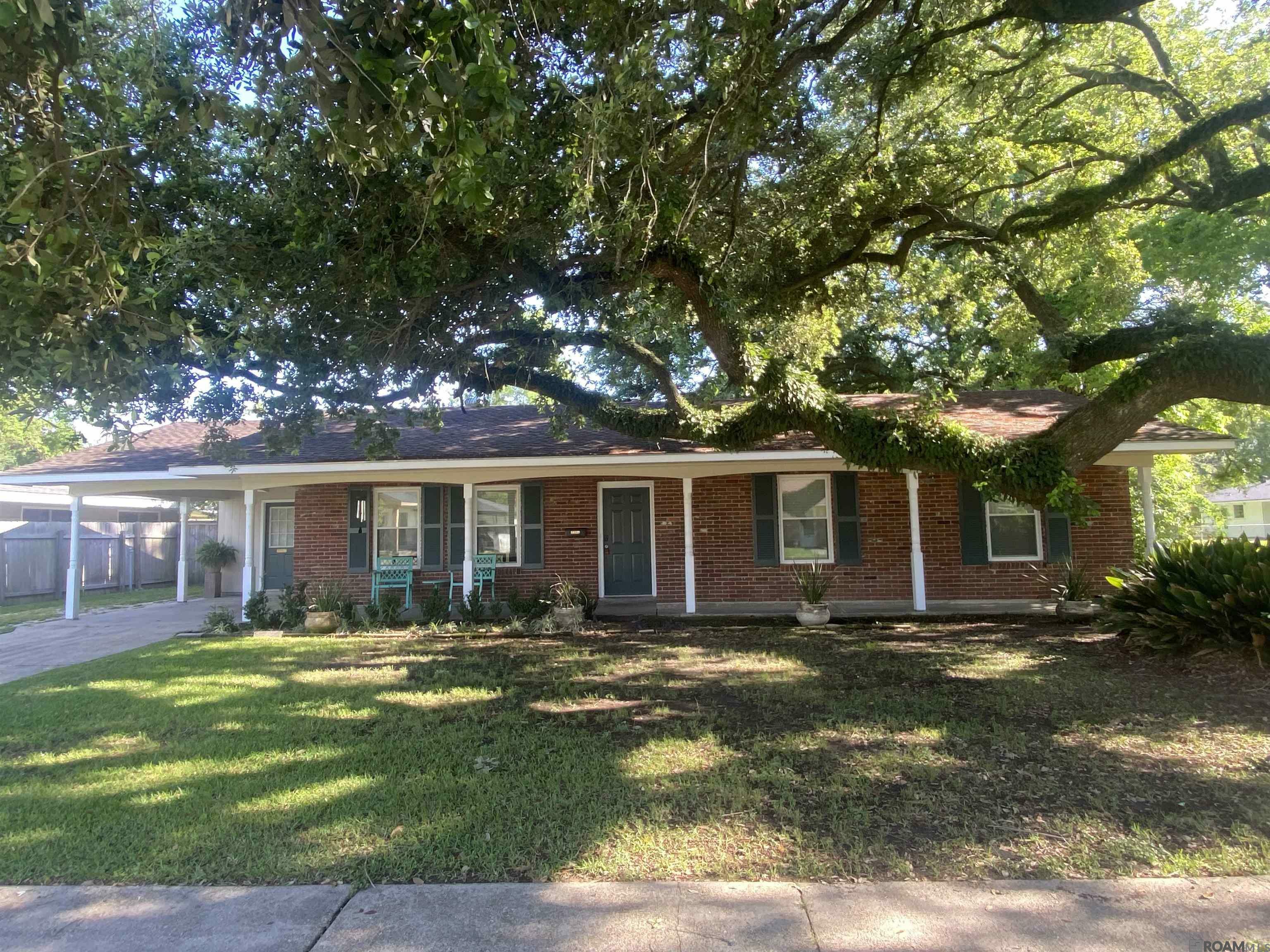 Property Photo:  10322 Lebanon St  LA 70816 