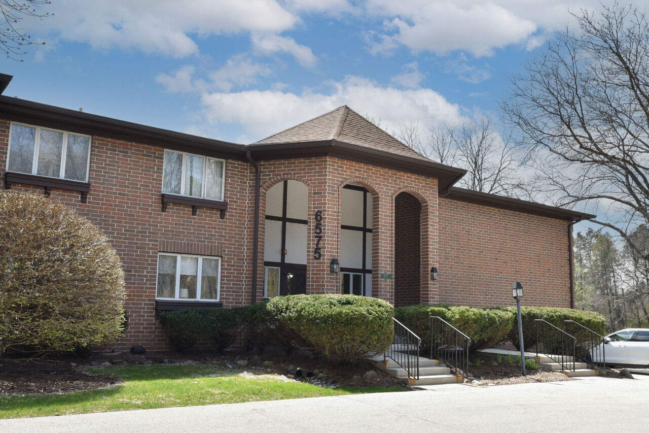 Property Photo:  6575 N Green Bay Ave 211  WI 53209