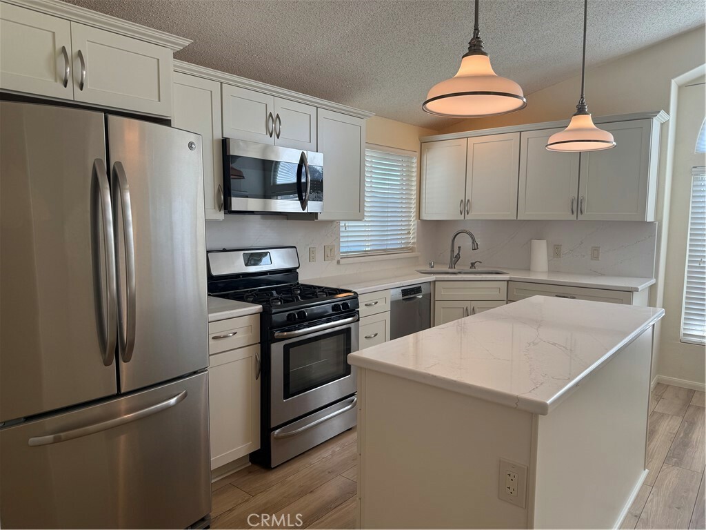 Property Photo:  140 W Pioneer Avenue 134  CA 92374 