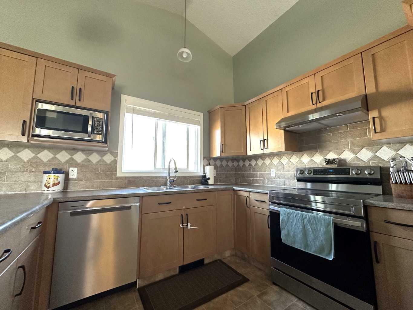 Property Photo: 10942 Obrien Lake Crescent AB T8W 0H5