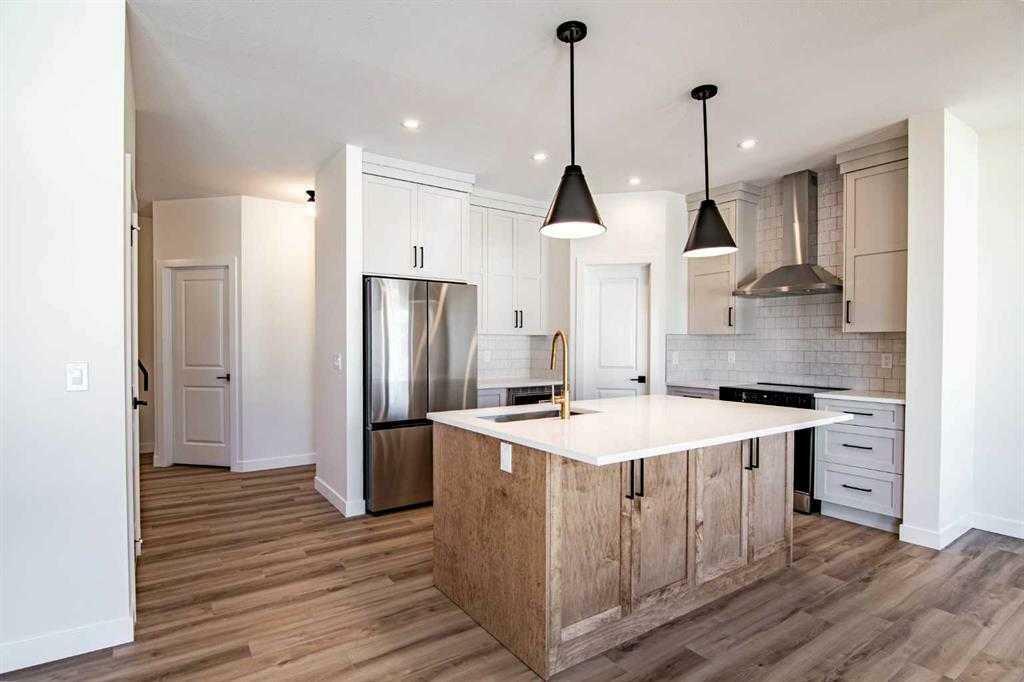 Property Photo: 202 Livingston Close AB T4R 0S8