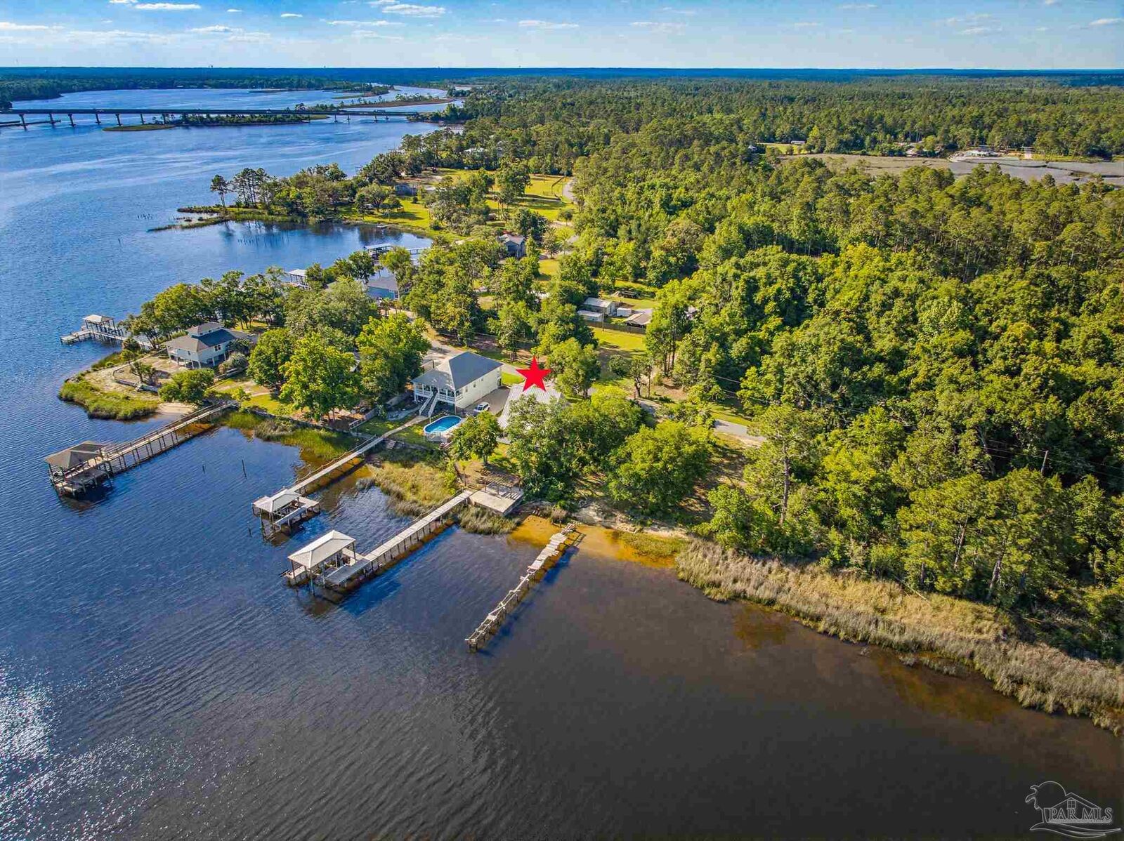 Property Photo: 7693 Petersen Pt Rd FL 32583