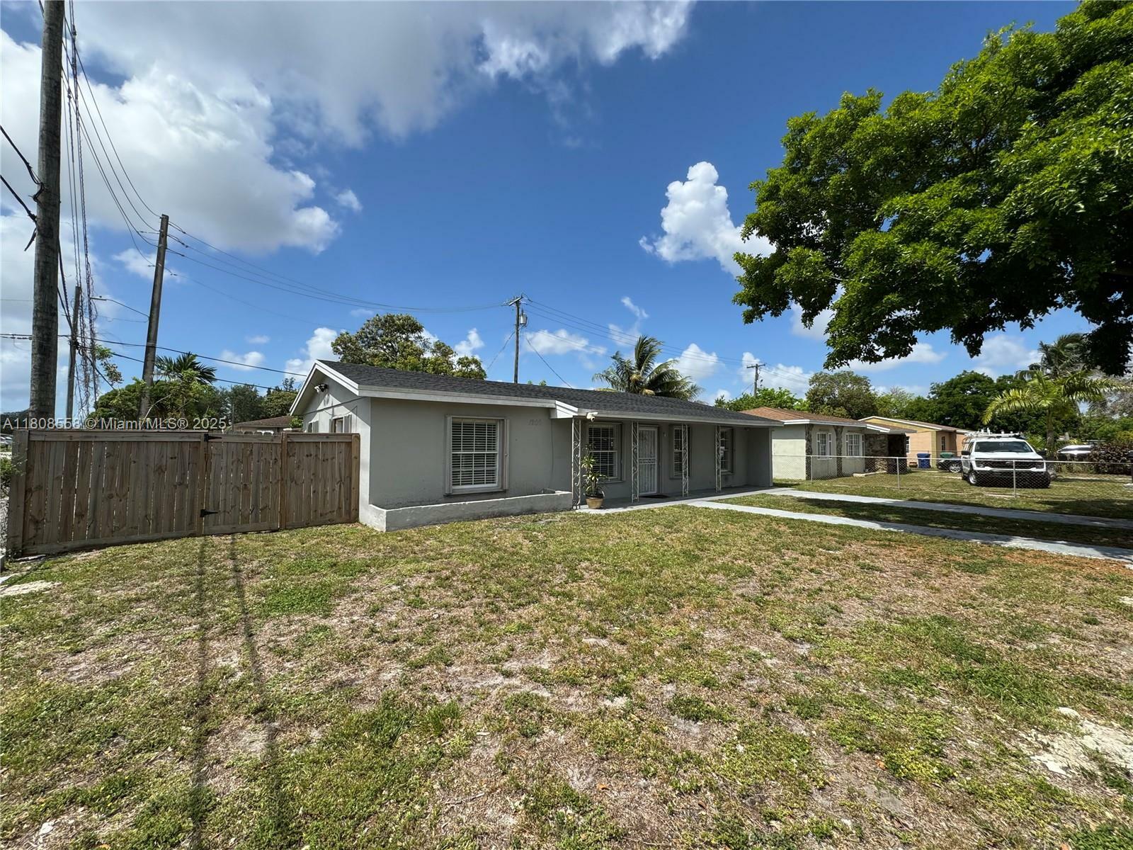 Property Photo: 1200 NW 87th St FL 33147