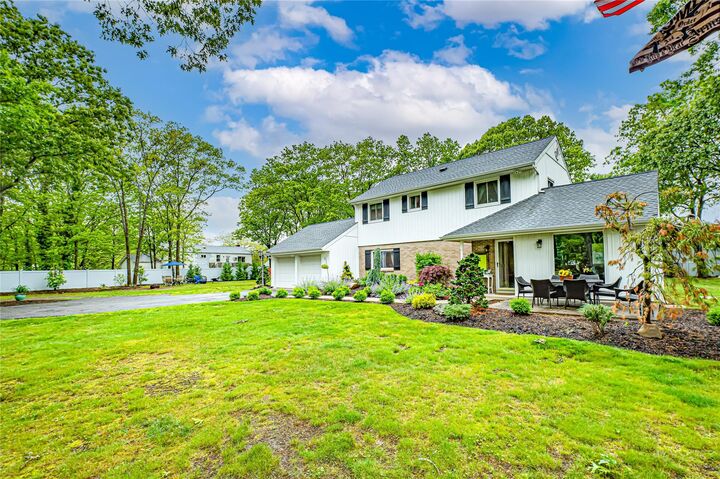 Property Photo:  1A Revlon Court  NY 11742 