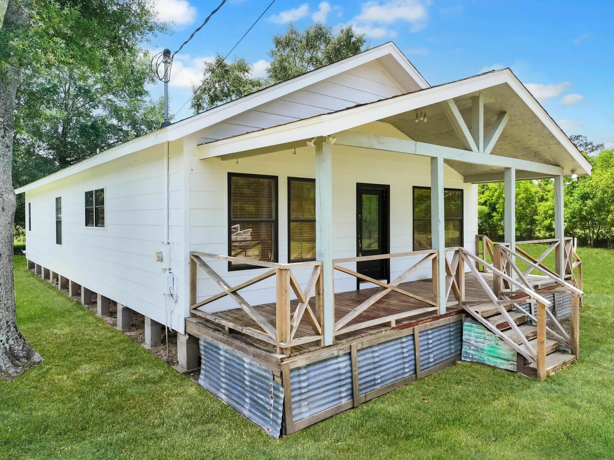 Property Photo:  2432 Hwy 327  TX 77625-6901 