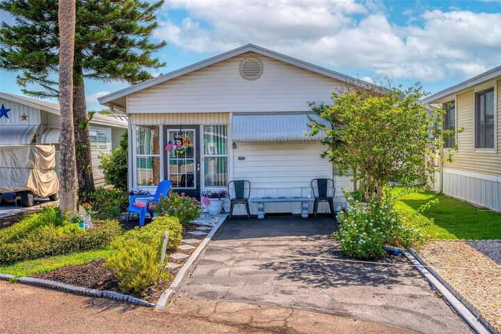 Property Photo:  9000 US Highway 192 115  FL 34714 