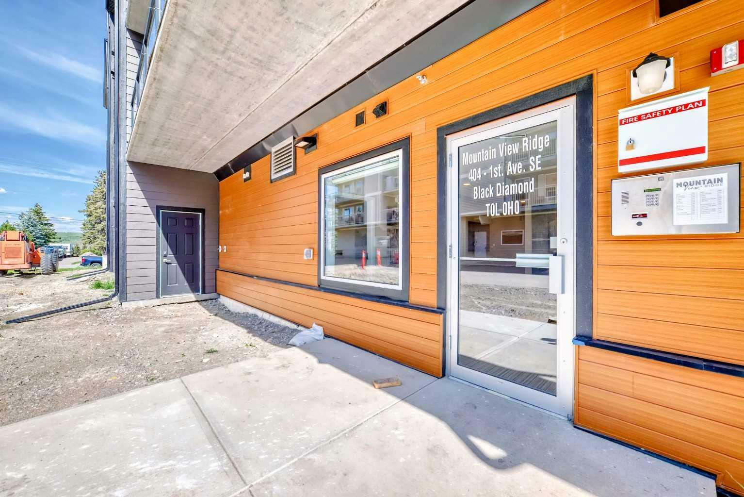 Property Photo: 404 1 Avenue SE 206 AB T0L 0H0