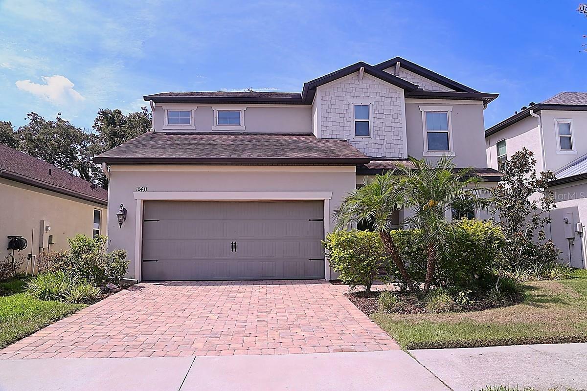Property Photo: 10431 Alcon Blue Drive FL 33578