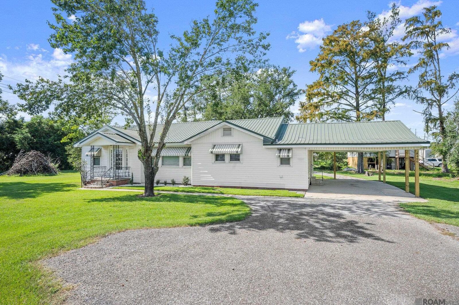 Property Photo:  8400 Main St  LA 70778 