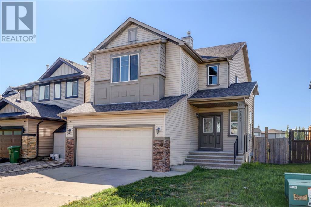 Property Photo:  2091 Luxstone Boulevard Southwest  AB T4B 0H4 