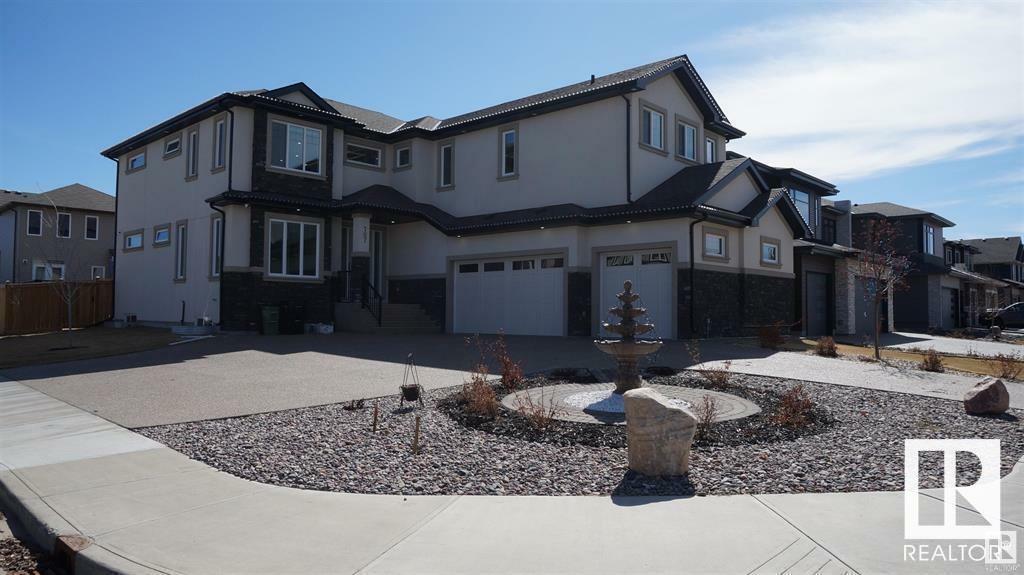 Property Photo: 707 180 Street SW AB T6W 2S8
