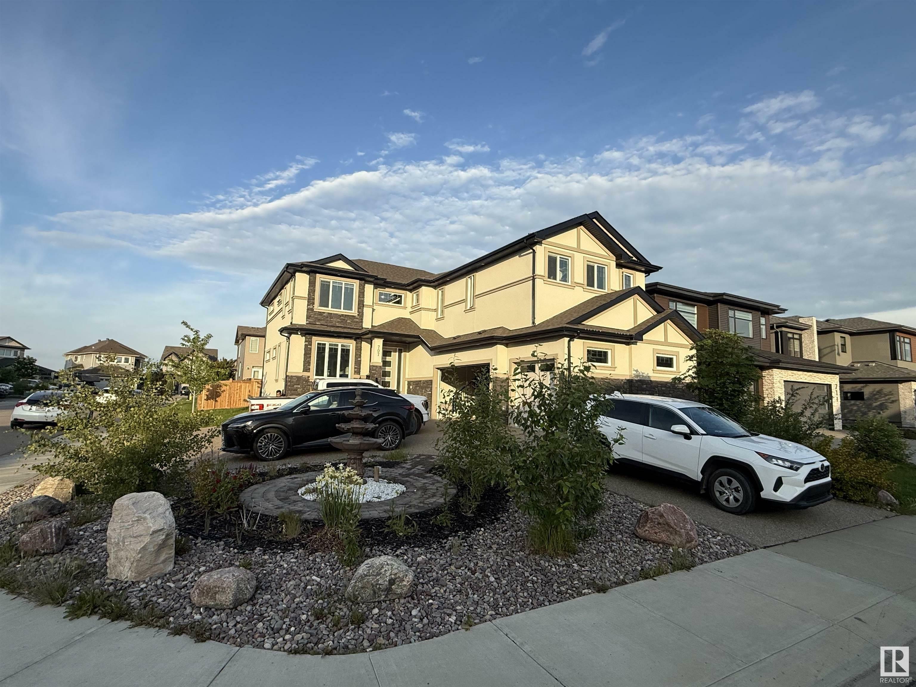 Property Photo: 707 180 Street SW AB T6W 2S8