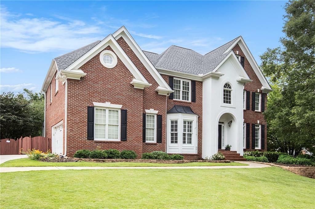 Property Photo: 650 Garden Wilde Place GA 30075