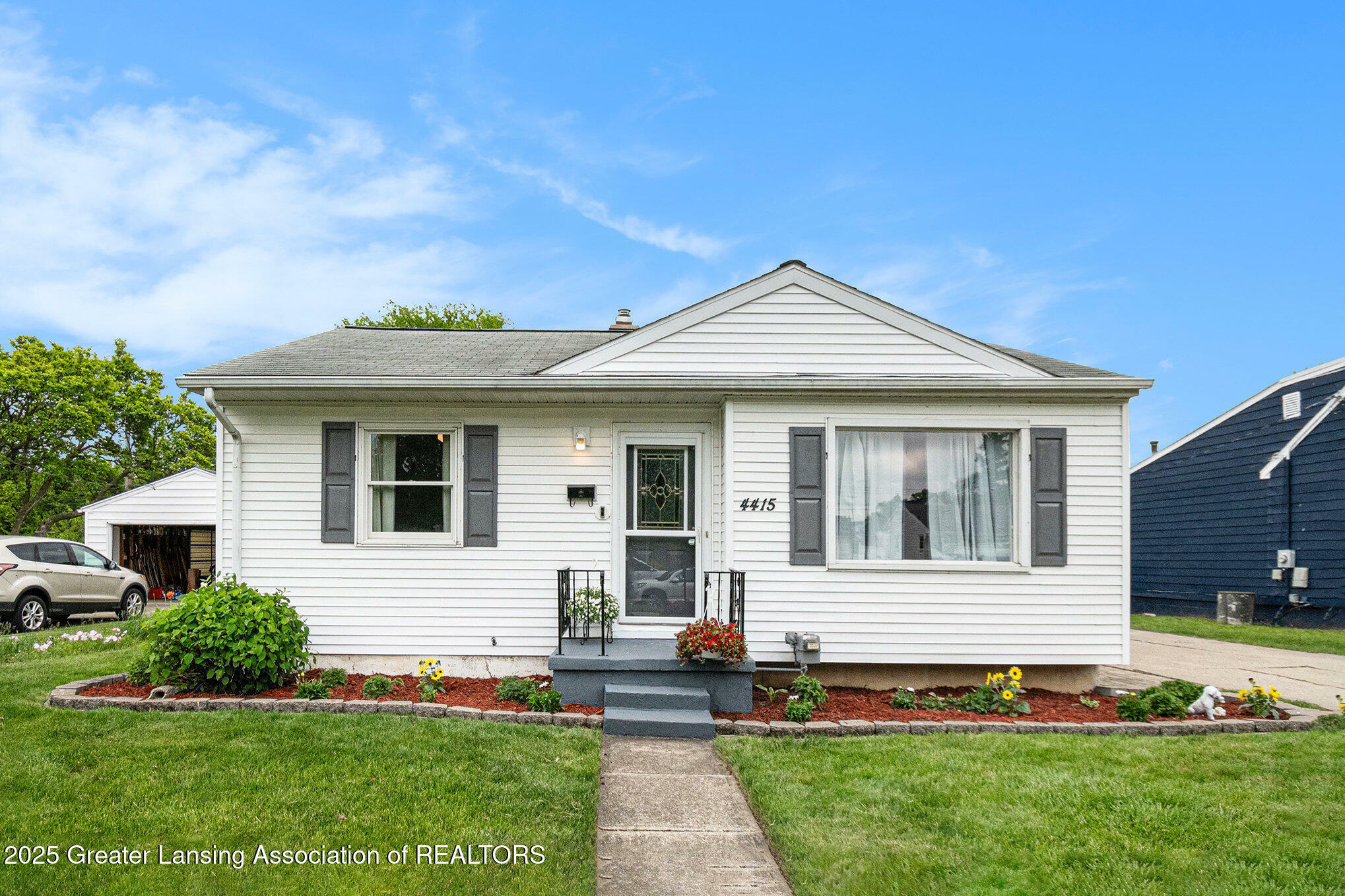 Property Photo: 4415 Devonshire Avenue MI 48910