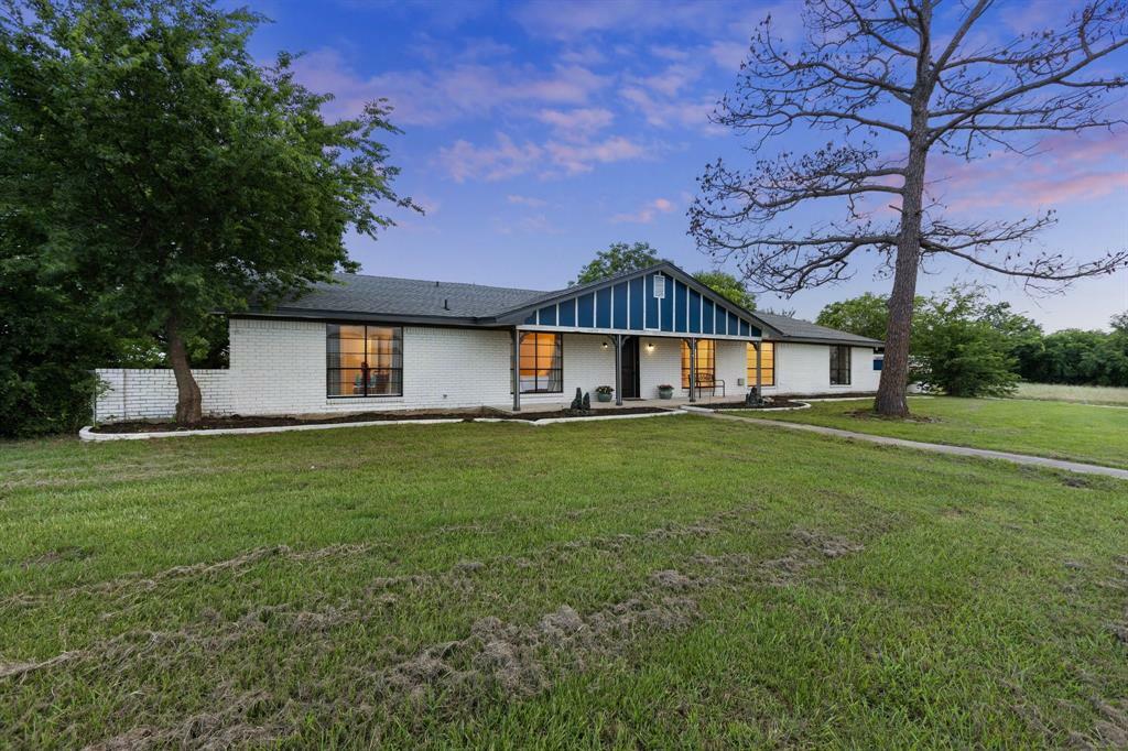 Property Photo: 713 W Rosemary Street TX 75474