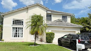 Property Photo: 9202 Olmstead Drive FL 33467