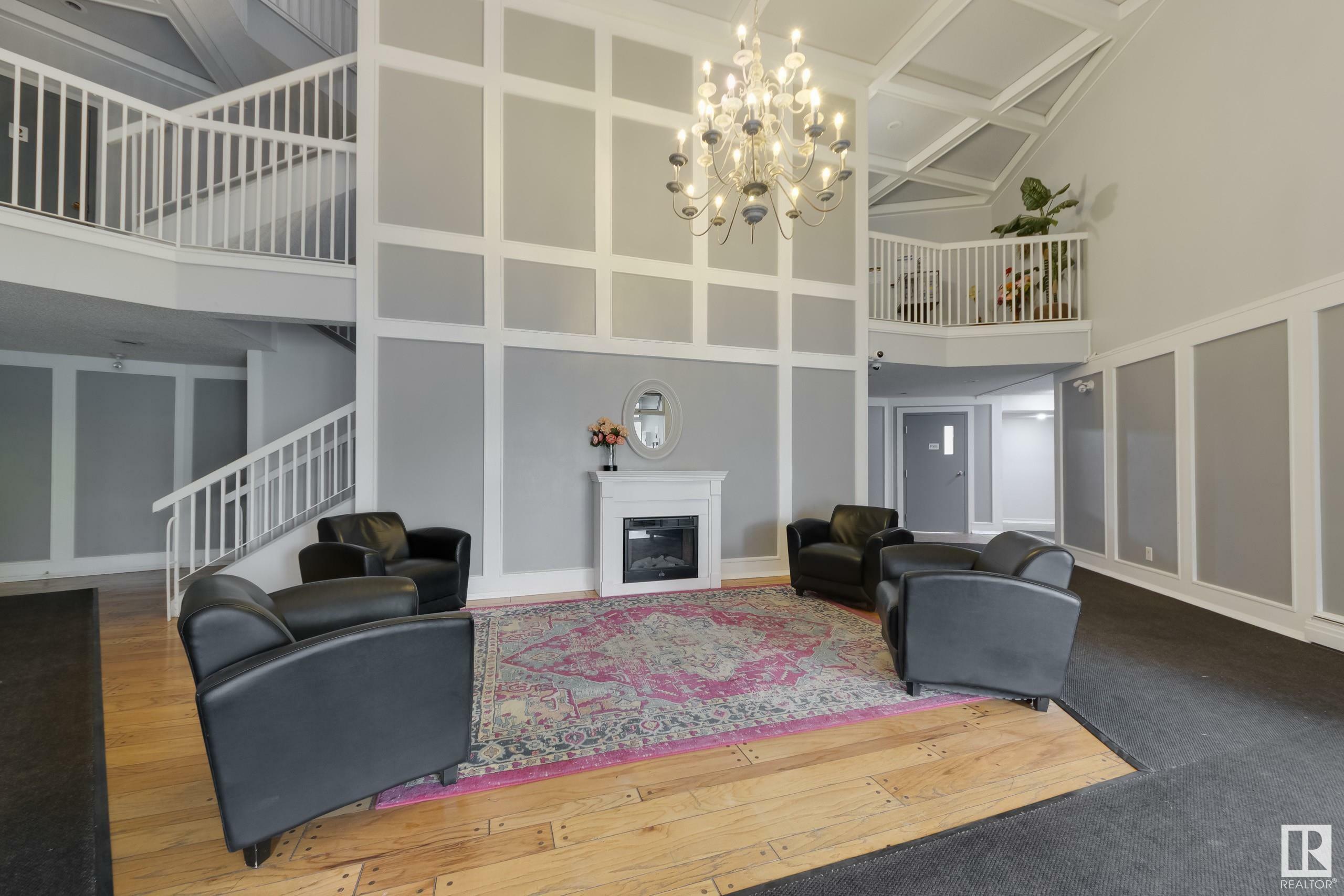 Property Photo: 5125 Riverbend Road NW 213 AB T6H 5K5