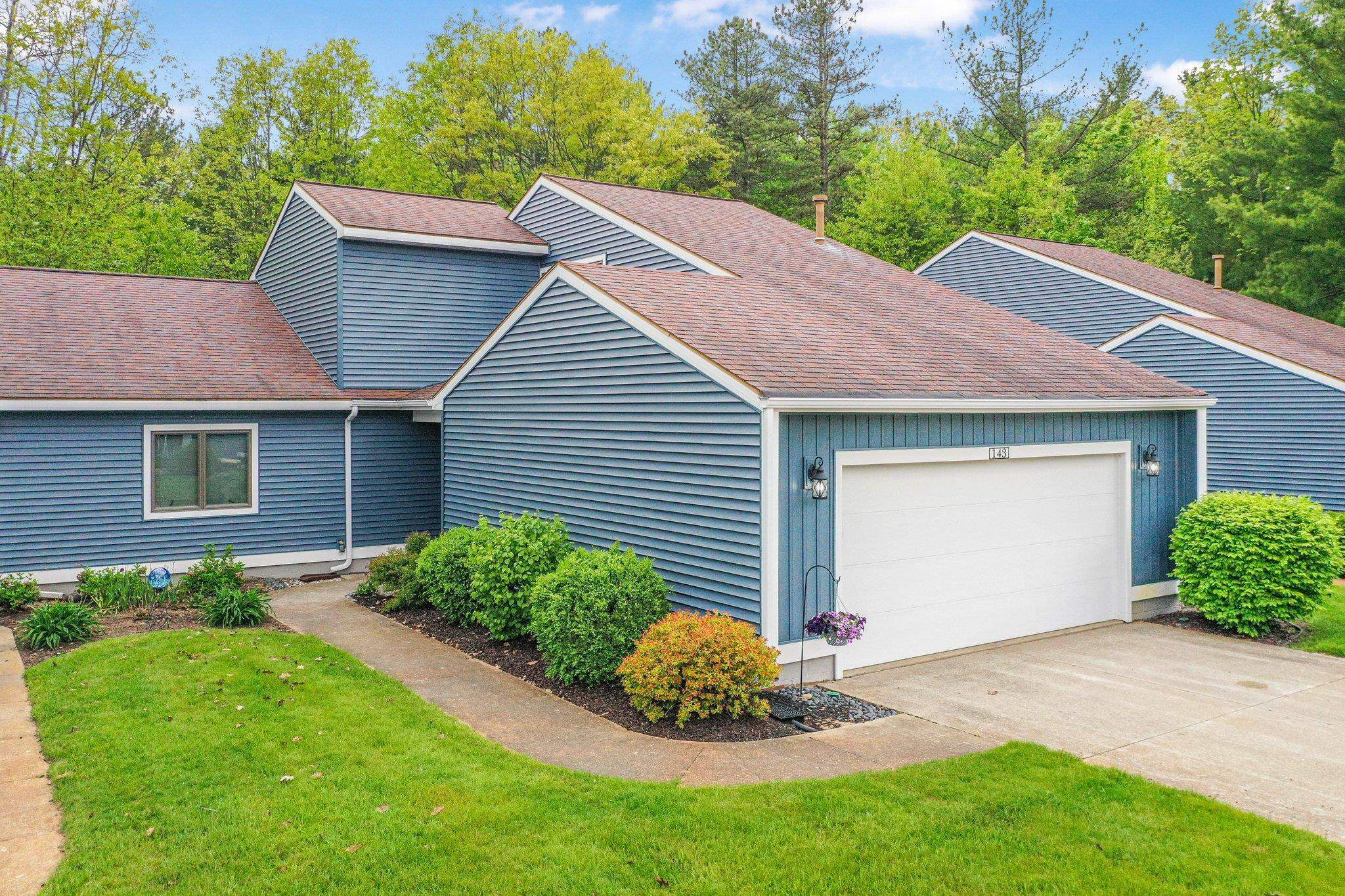 Property Photo: 143 North Shore Drive West 15 MI 49601