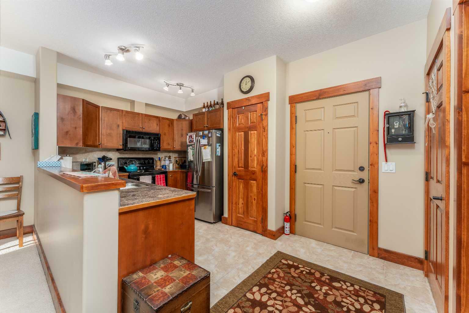 Property Photo: 155 Crossbow Place 207 AB T1W 3H6