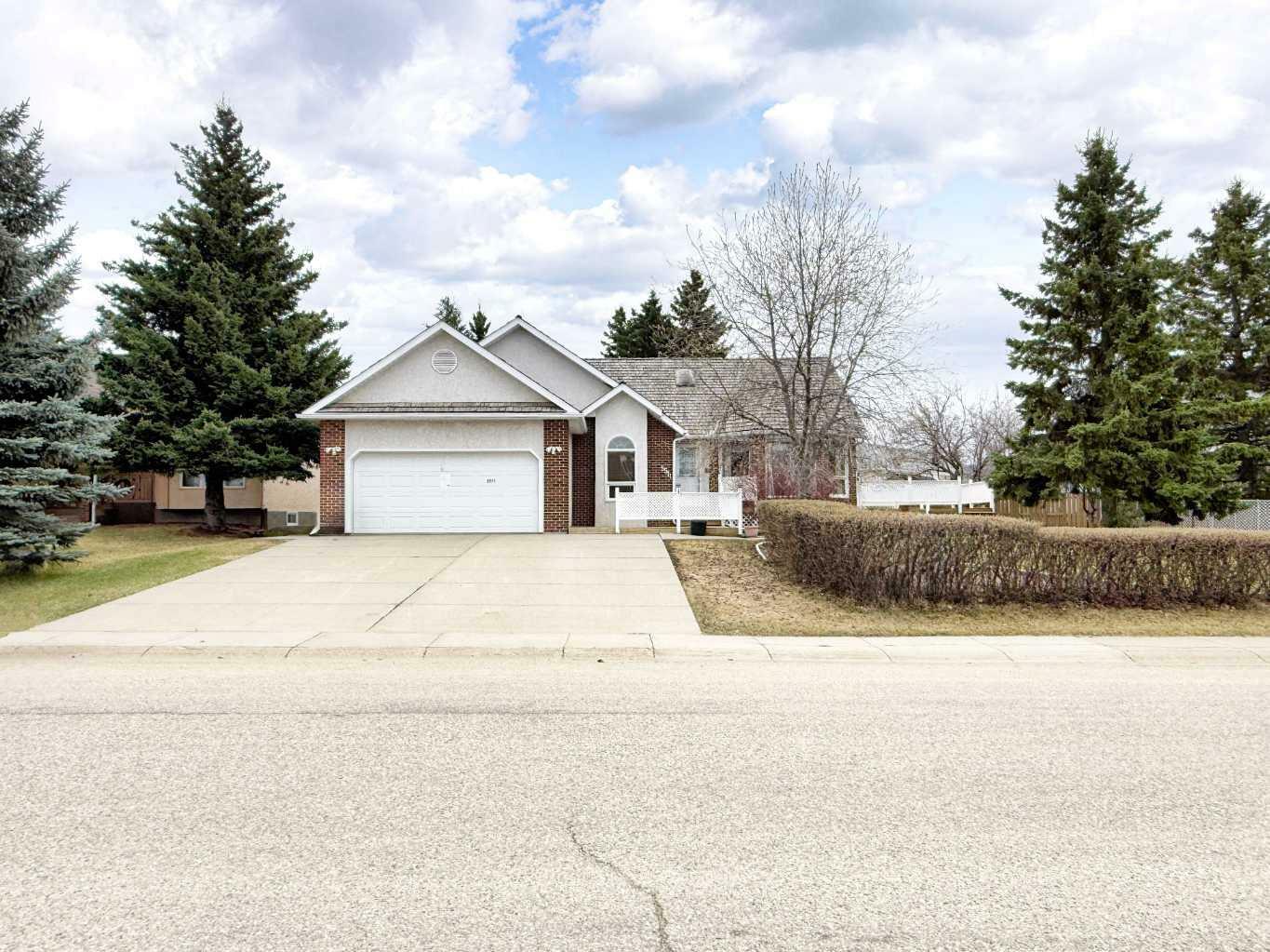 Property Photo: 5511 Shannon Drive AB T4H 1C2
