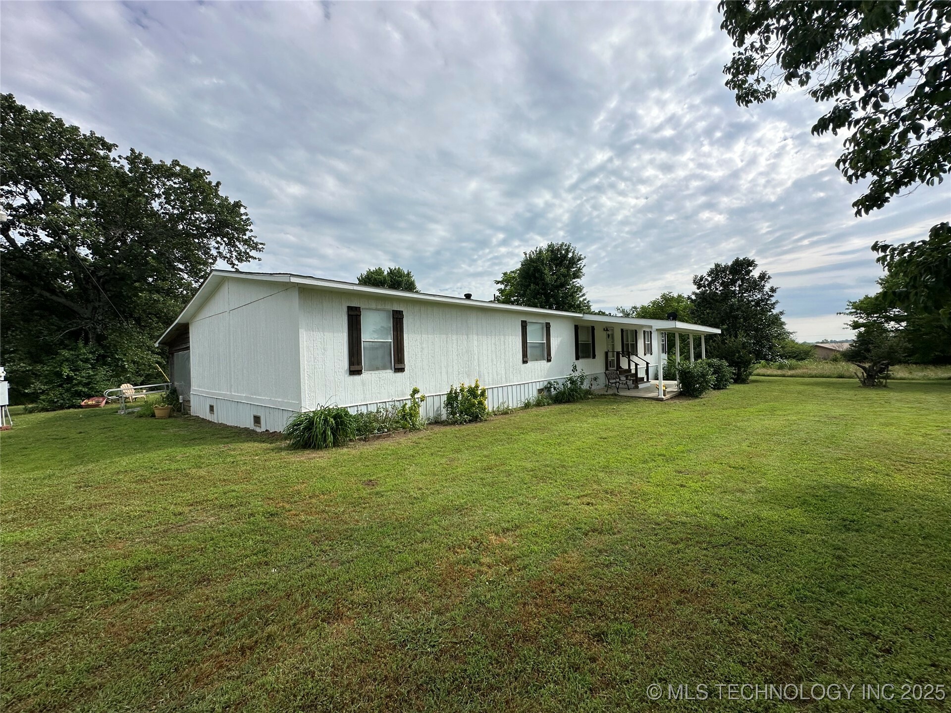 Property Photo: 5831 E 93rd Street S OK 74403