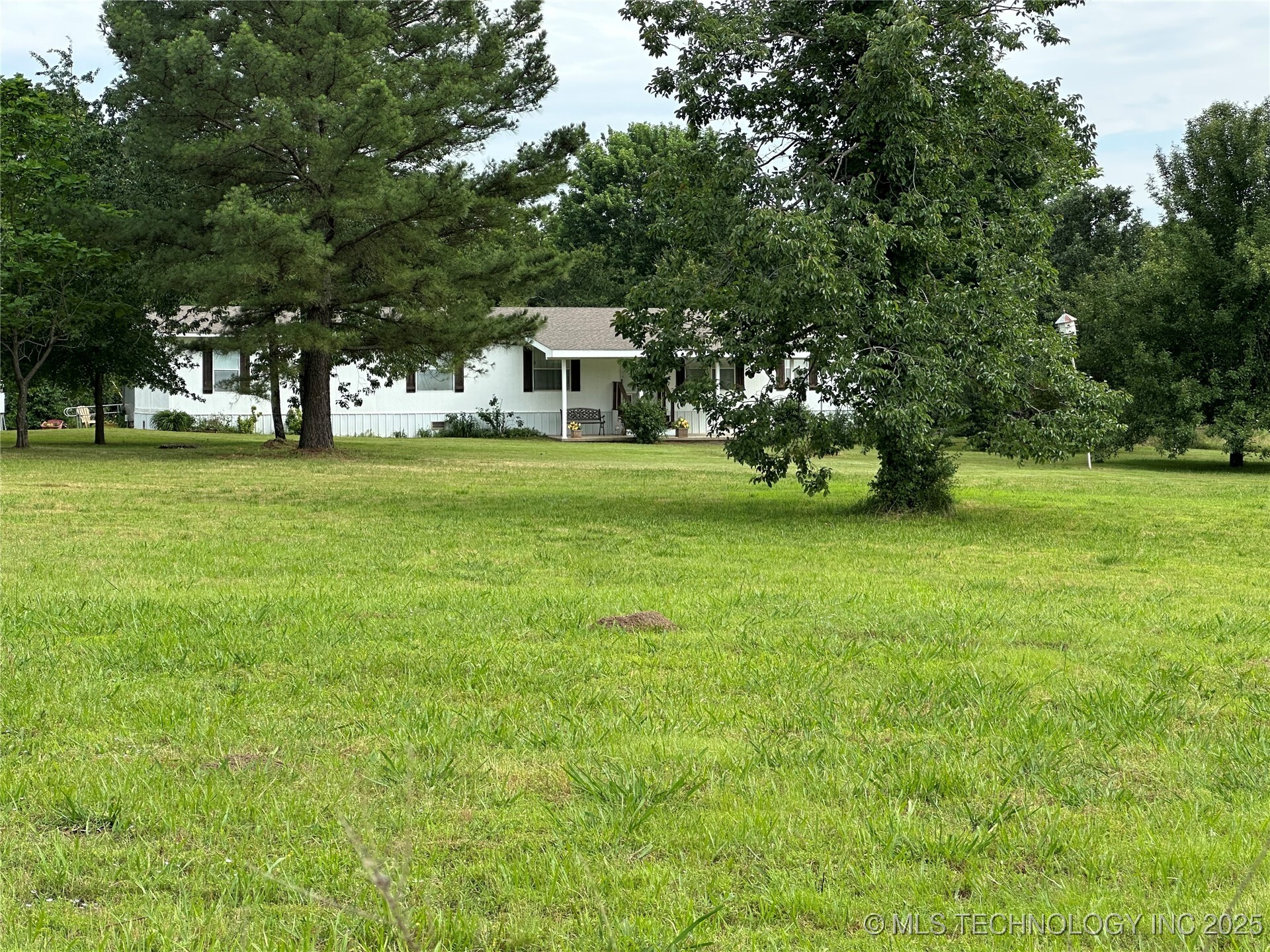 Property Photo: 5831 E 93rd Street S OK 74403