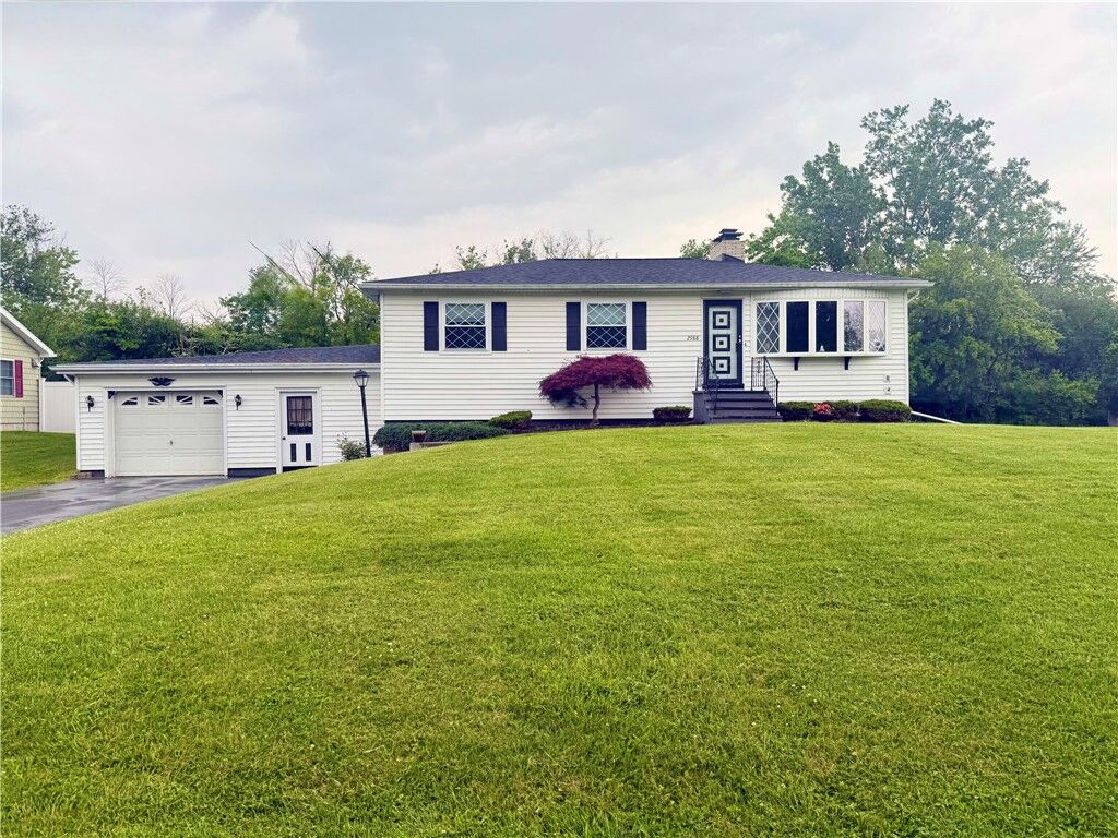 Property Photo:  2988 East Avenue  NY 13165 