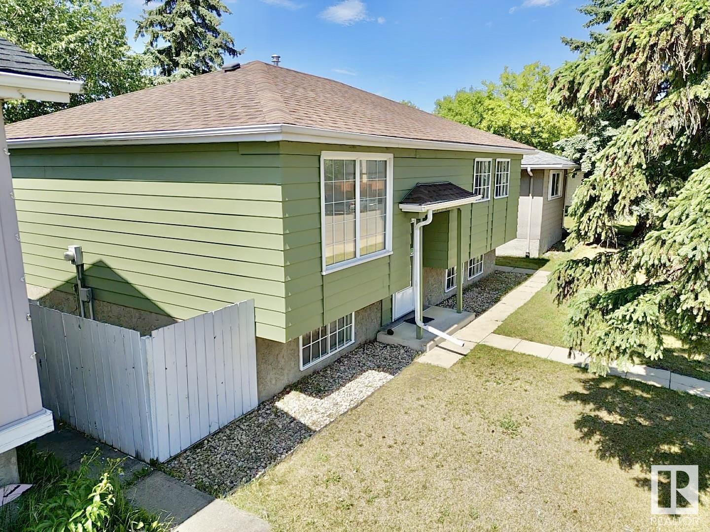 Property Photo:  14240 23 Street NW  AB T5Y 1E8 