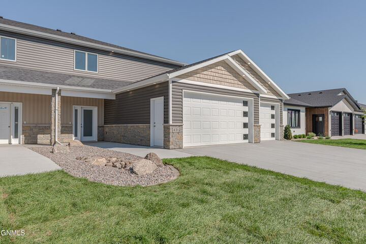 Property Photo:  4312 Downing Street  ND 58504 
