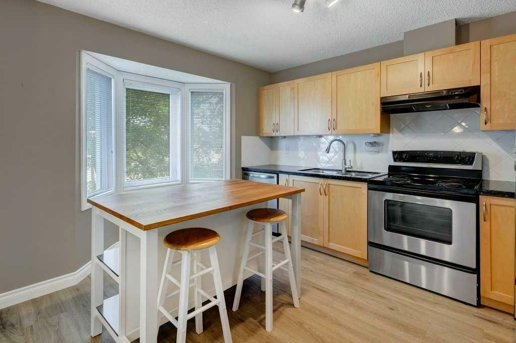 Property Photo: 135 Cedarwood Lane SW AB T2W 6J3