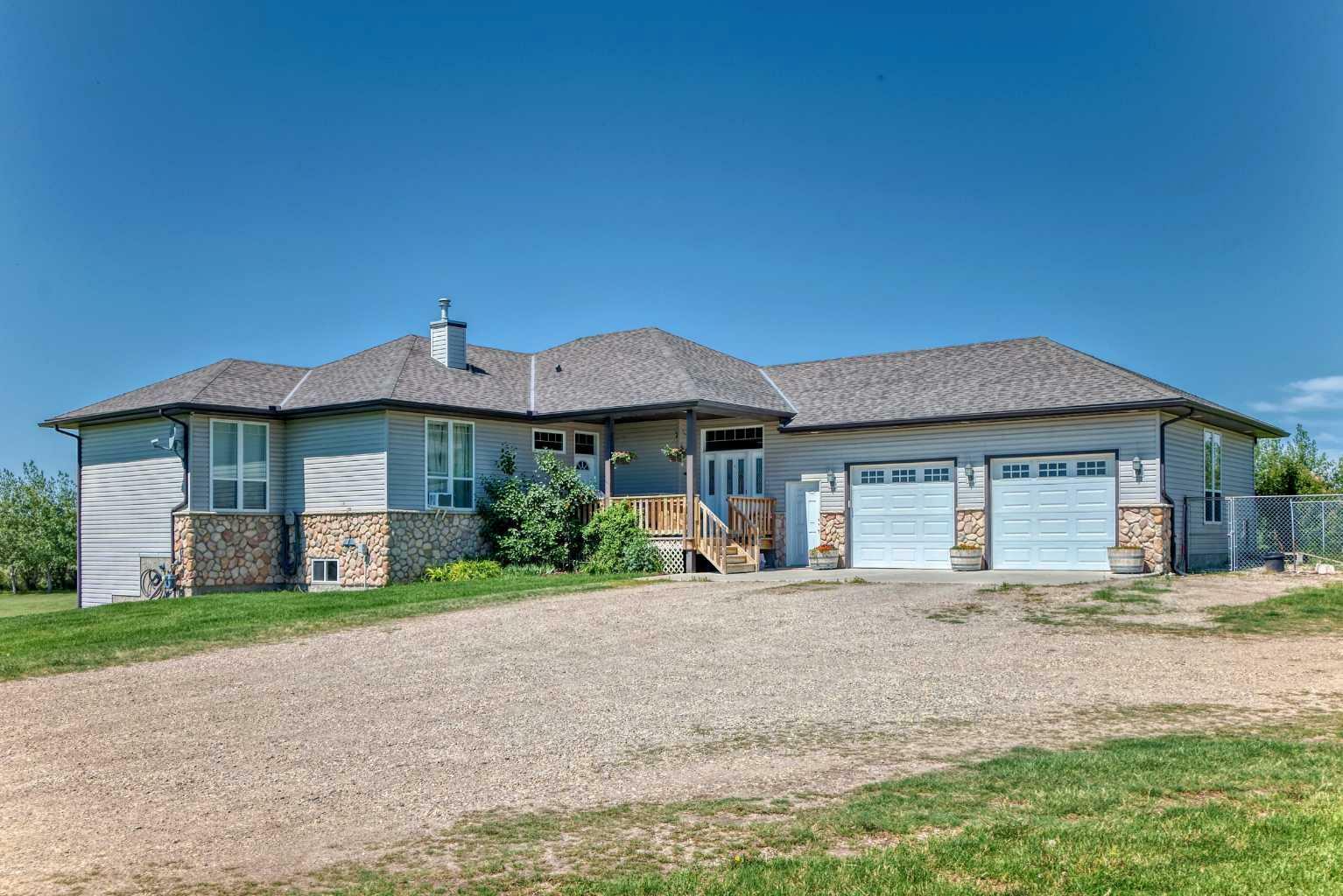 Property Photo: 263101 Range Road 14 AB T4B 3L5
