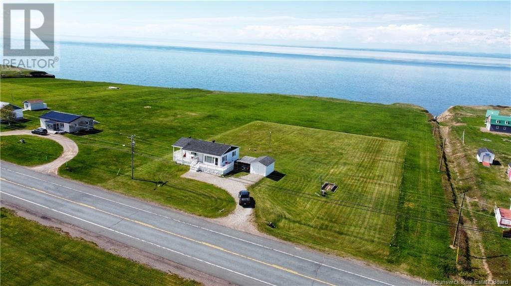 Property Photo:  506 Rue Acadie  NB E8N 1E4 