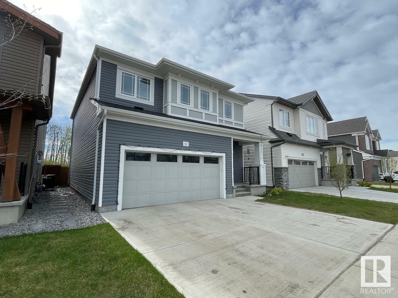 Property Photo: 947 Stillwater Boulevard NW AB T6M 1M7