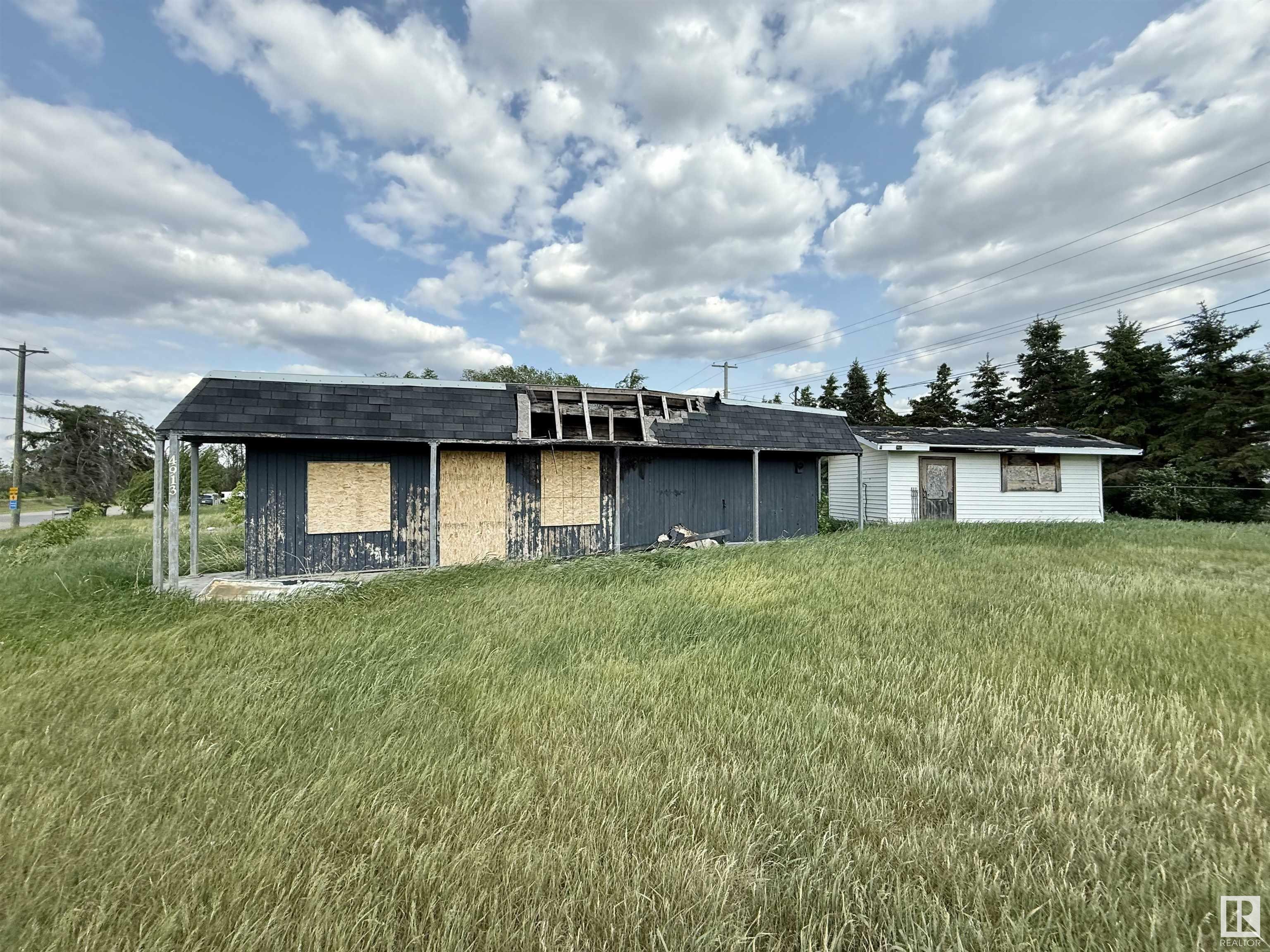Property Photo: 4913 & 4909 49 Avenue AB T0A 1P0