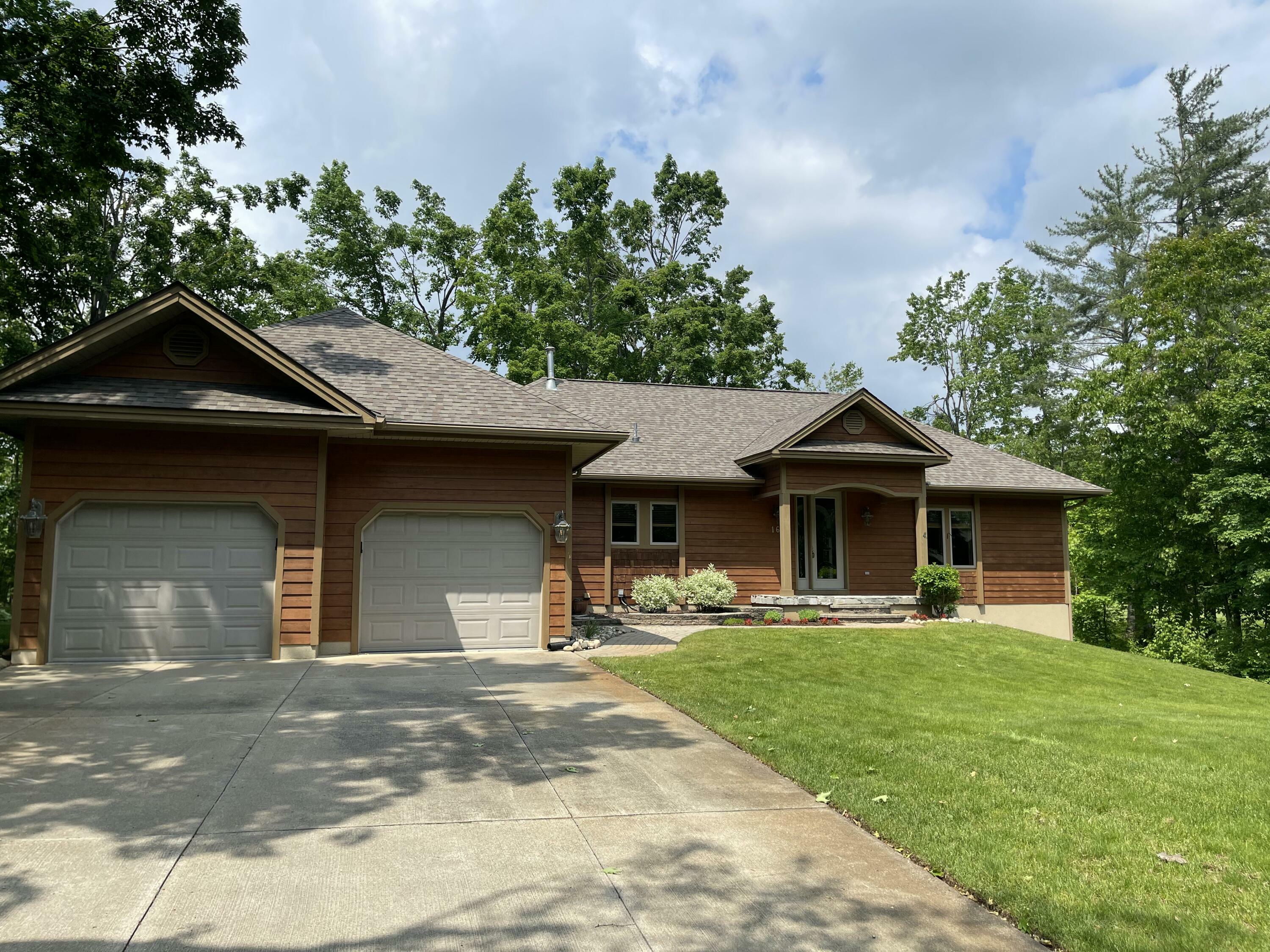 Property Photo: 164 Invitational Drive MI 49735
