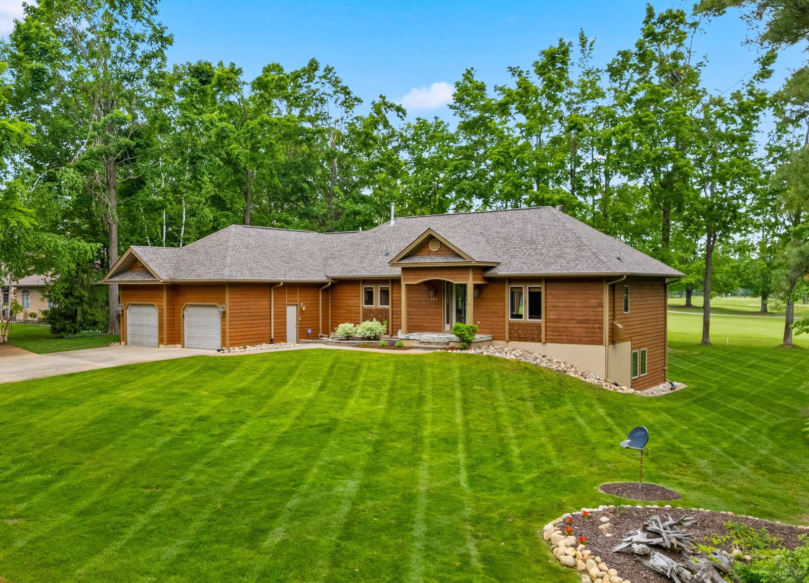 Property Photo:  164 Invitational Drive  MI 49735 