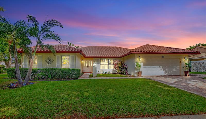 Property Photo: 243 Deer Creek Woodlake Circle FL 33442