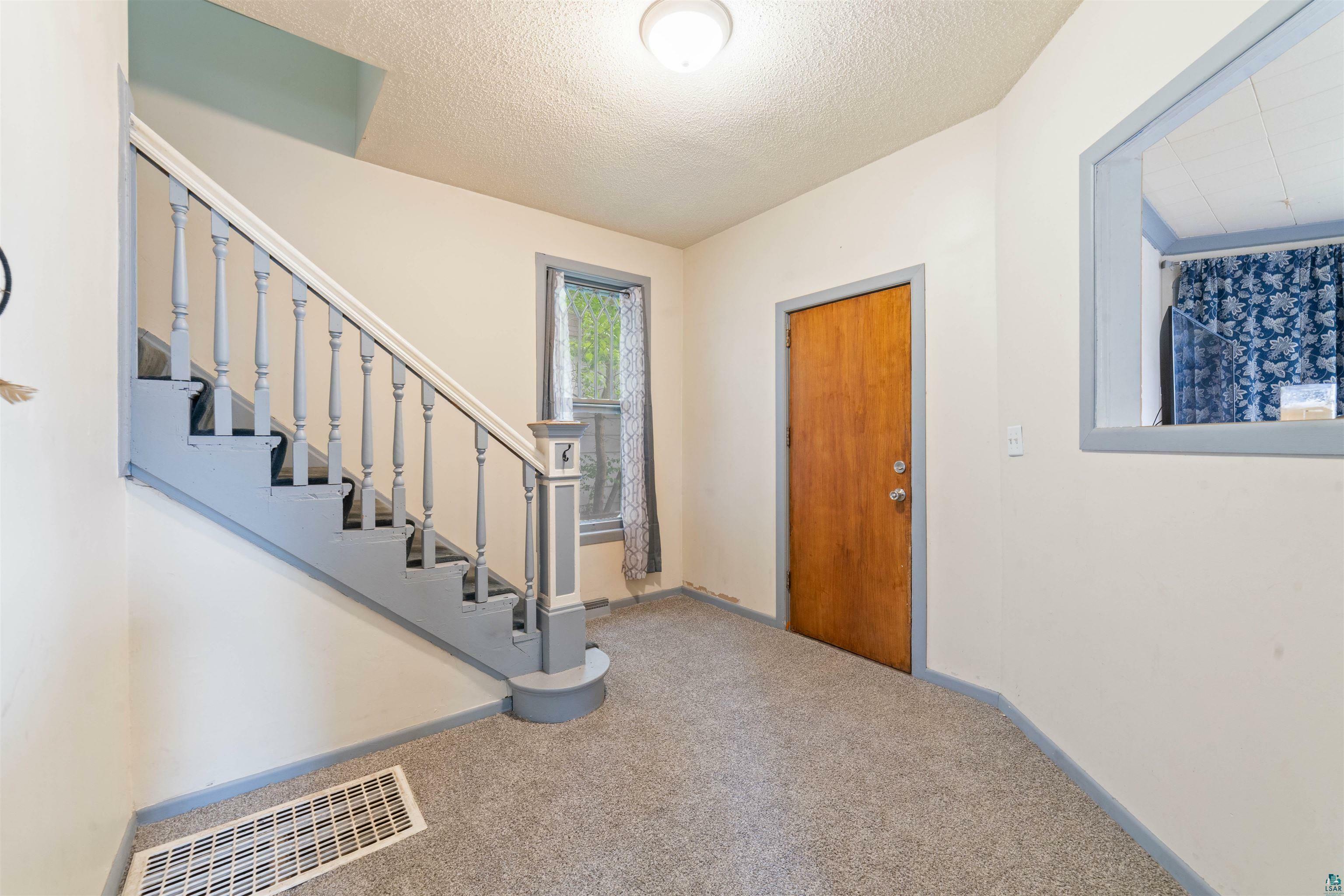 Property Photo: 30 N 25th Ave W MN 55806